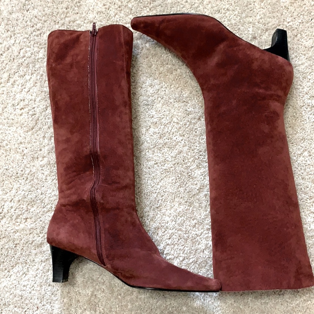 Burgundy Classique knee high boots.